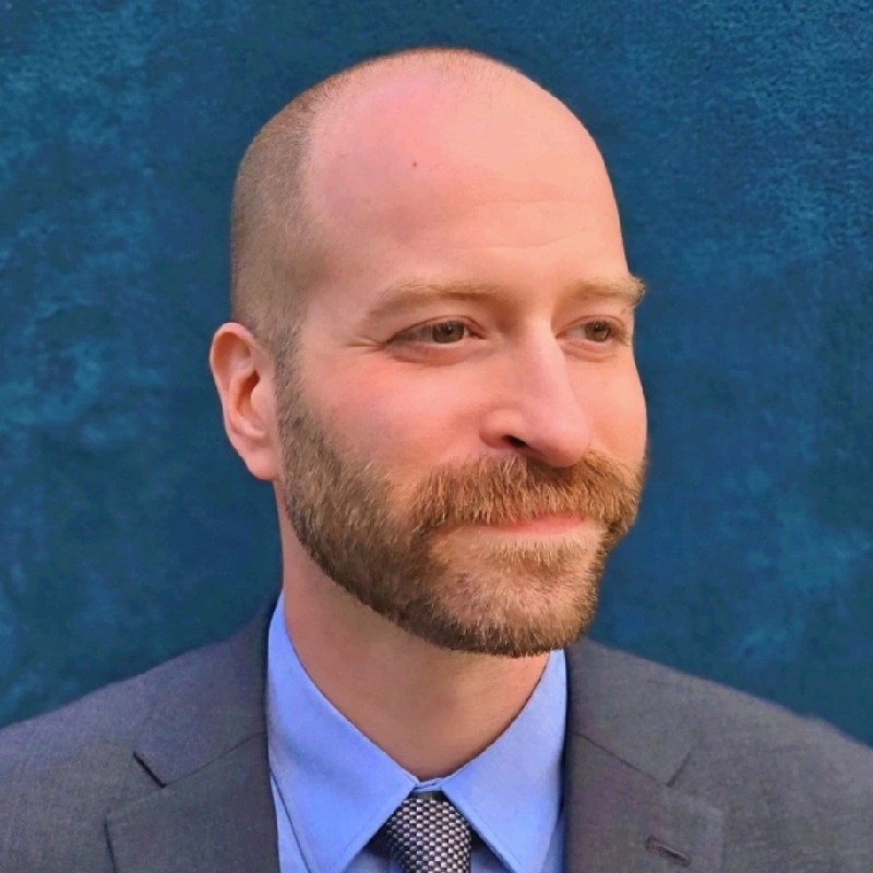 Professional headshot of Omri Gross